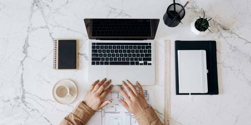 Business owner comparing martech tool options on a selection checklist