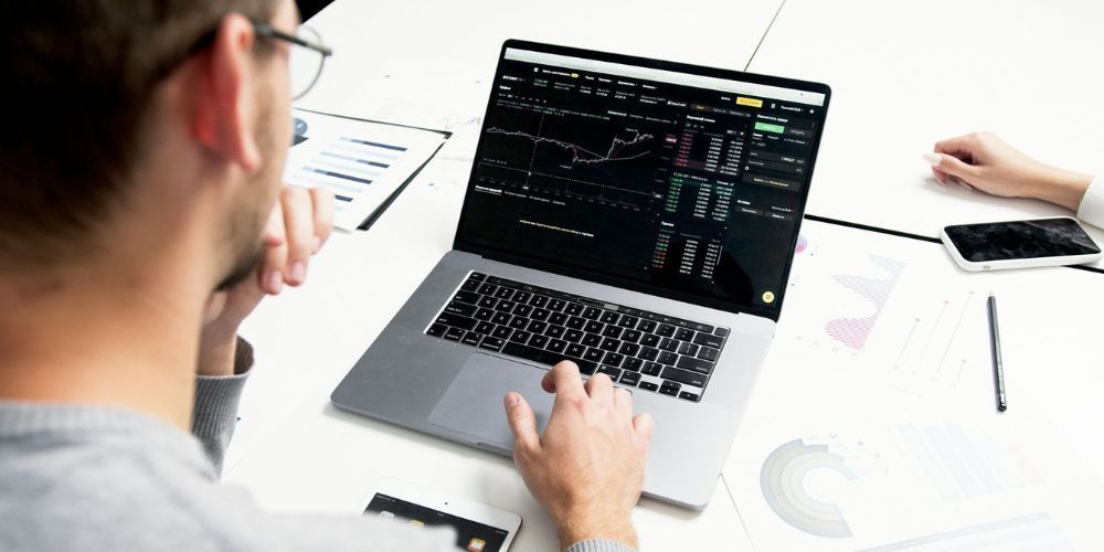 Sales team reviewing AI-enriched CRM insights that drive revenue
