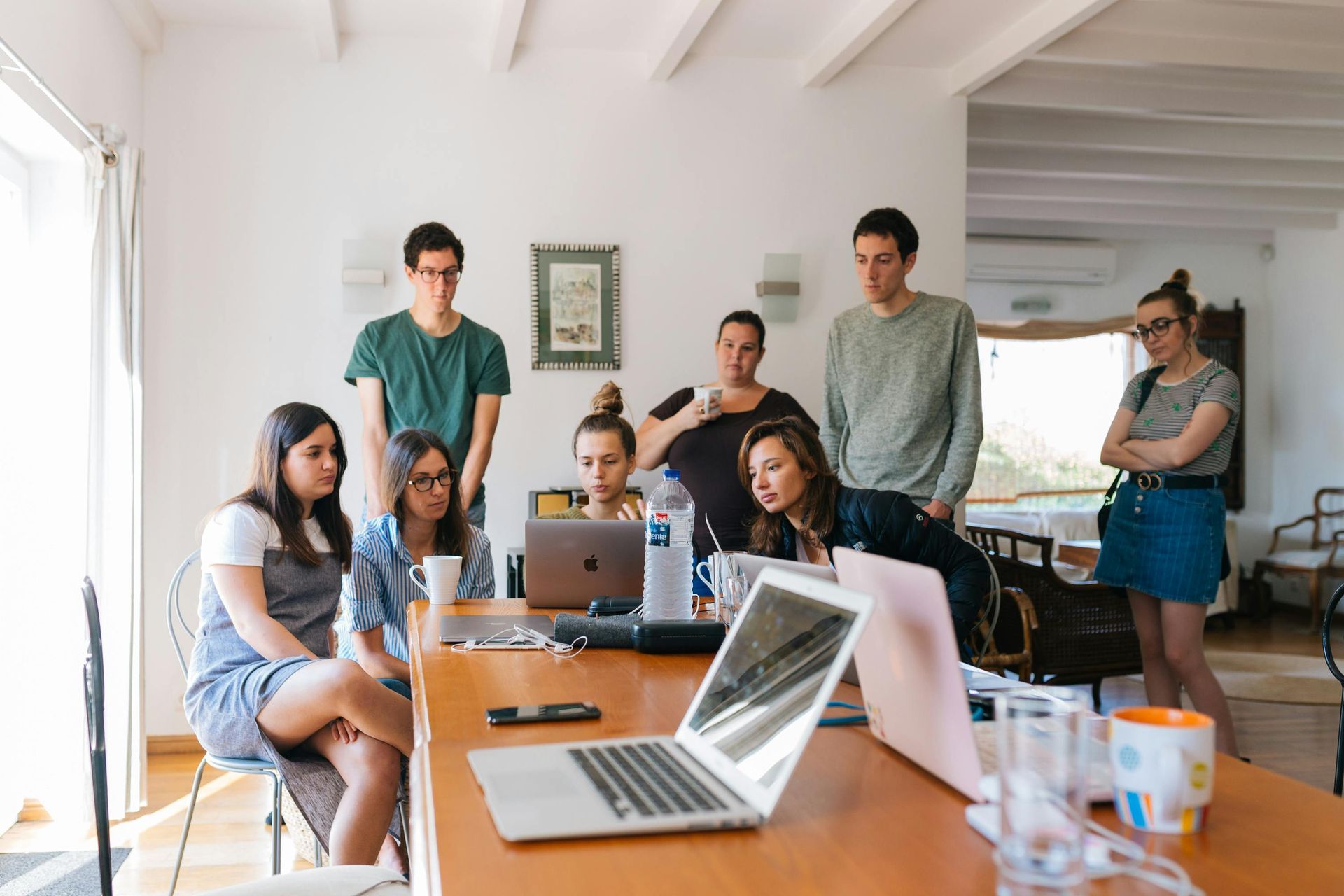 Cross-functional team executing a digital strategy in a modern workspace