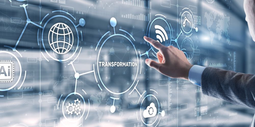 Employees adapting their workflows around new technology during transformation